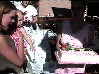 Aunt Raemie & Ashlynn getting ready to blow out the candle.