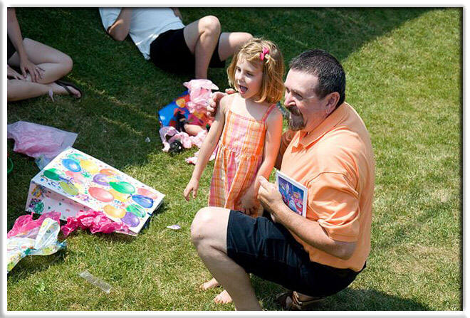 Ashlynn get the first look at her new Princess bike.