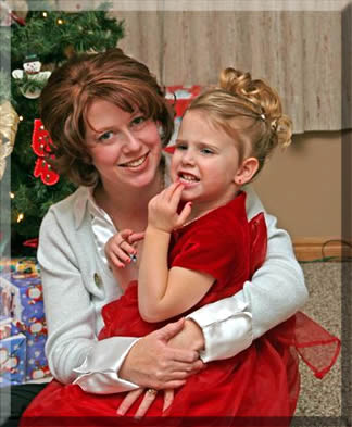 Mommy says "make a pretty smile"