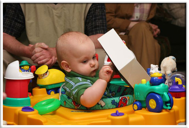 As usual, the kid likes the box better than the gift.
